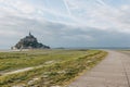 beautiful view of famous mont saint michel and walkway at sea coast, normandy,